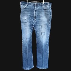 Late 70s black label Levi's for Men Vintage patched thrashed 41 in